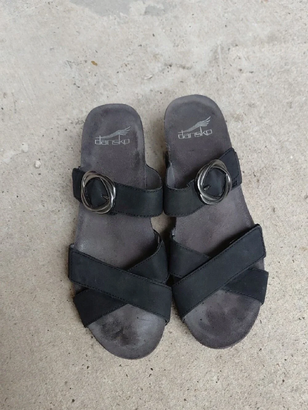 Dansko Black Leather Wedge Sandals with Cork-Textured Heel